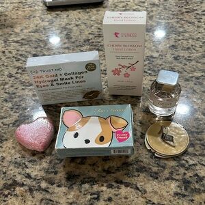 Two Faced Pretty Puppy Eyeshadow case with other Essentials